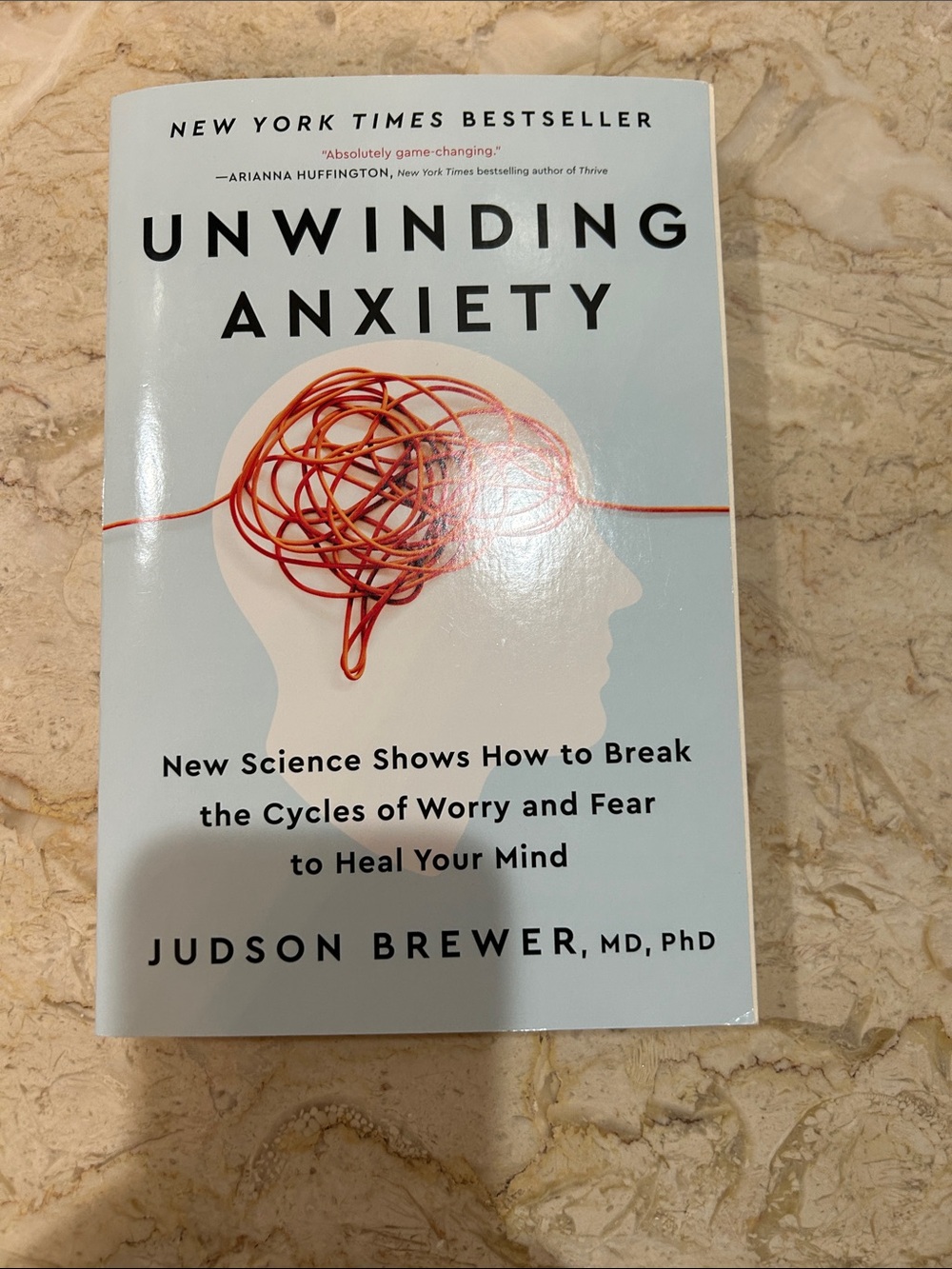 Unwinding Anxiety by Judson Brewer - Light Blue Cover with Red Accent